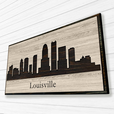 Louisville Kentucky city skyline wood all art. Custom carved into solid wood and features Howdy Owl's one-of-a-kind unique wood wall art finish. Personalized with your own text and a great gift idea for any occassion. Handcrafted in Ashland, Nebraska with shipping offered world-wide.