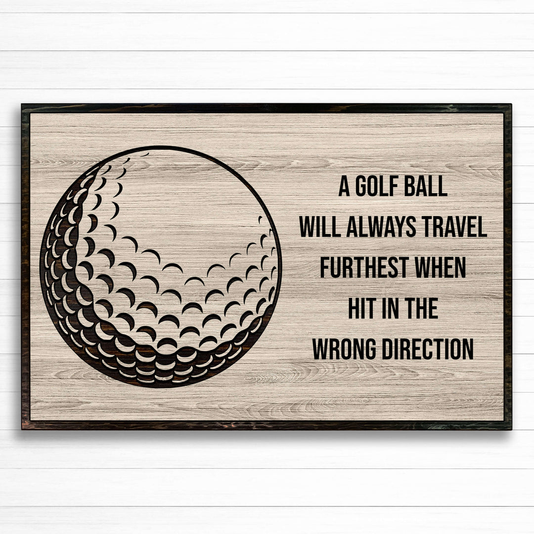 Golf ball wood wall art. Custom carved sports wall decor that is perfect for the basement, office, bar, basement, or man cave.