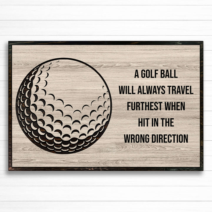 Golf ball wood wall art. Custom carved sports wall decor that is perfect for the basement, office, bar, basement, or man cave.