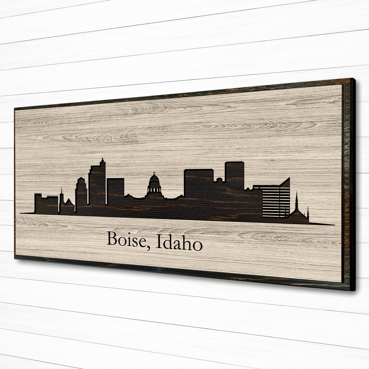 Boise, Idaho city skyline wood all art. Custom carved into solid wood and features Howdy Owl's one-of-a-kind unique wood wall art finish. Personalized with your own text and a great gift idea for any occassion. Handcrafted in Ashland, Nebraska with shipping offered world-wide.