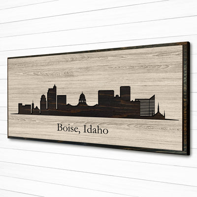 Boise, Idaho city skyline wood all art. Custom carved into solid wood and features Howdy Owl's one-of-a-kind unique wood wall art finish. Personalized with your own text and a great gift idea for any occassion. Handcrafted in Ashland, Nebraska with shipping offered world-wide.