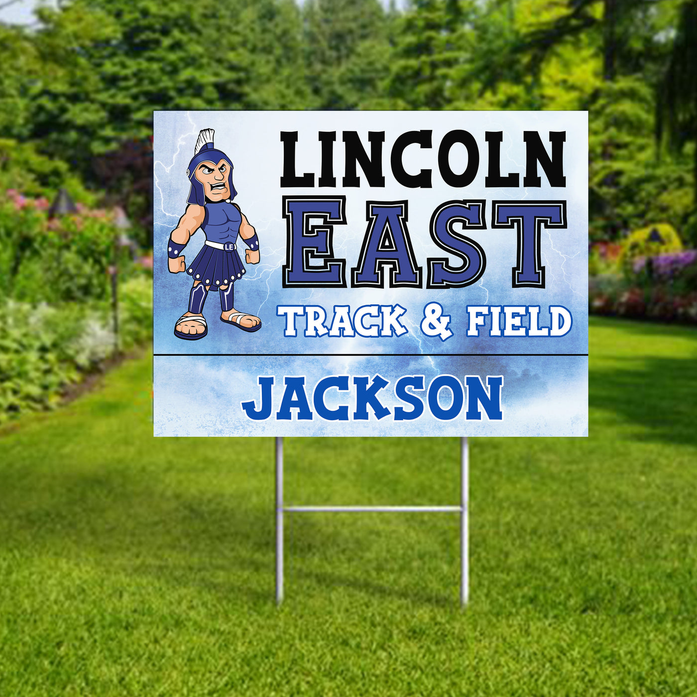 Personalized yard sign for Lincoln East Spartans sports team player. The sign features the team logo in the center, surrounded by a background in team colors.