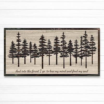 Pine tree forest wood wall art carved into solid wood. The stunning artwork features a carved pine tree scene nestled against a serene forest backdrop. That natural variations in the wood grain add a depth and character to the overall design, creating a warm and inviting atmosphere for any room.