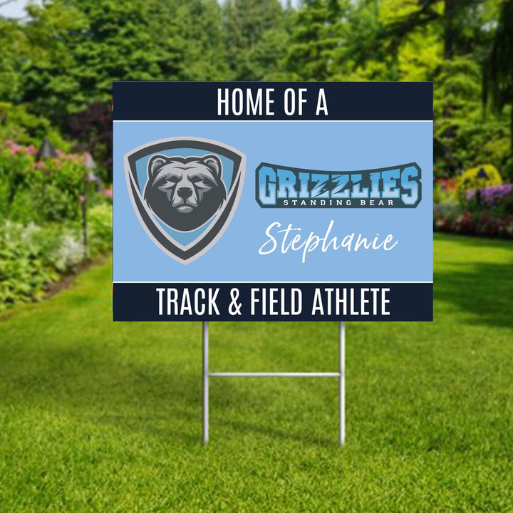 Personalized yard sign for Standing Bear Grizzlies sports team player. The sign features the team logo in the center, surrounded by a background in team colors.