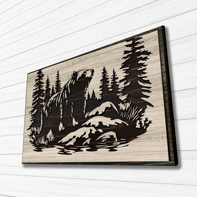 Grizzly bear carved wood wall art featuring Howdy Owl's unique, one of a kind wood finish. This wall art features a grizzly bear, pine tree forest, mountain nature scene that is carved into wood. Handcrafted at our shop located in Ashland, Nebraska our wood wall art can have a distressed tan main board with a dark brown stained carving and edge, or a distressed gray main board with a black stained carving and edge.