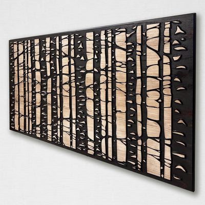 Custom birch tree scene that is zoomed in and carved into wood. Abstract wood wall art by Howdy Owl is offered in two different finish colors and 5 different sizes. The finish colors will be a distressed tan main board with a dark brown stained carving and edge. Or you can choose the distressed gray main board with a black stained carving and edge. This cabin & nature art is neutral and go with most any rustic or modern decor.