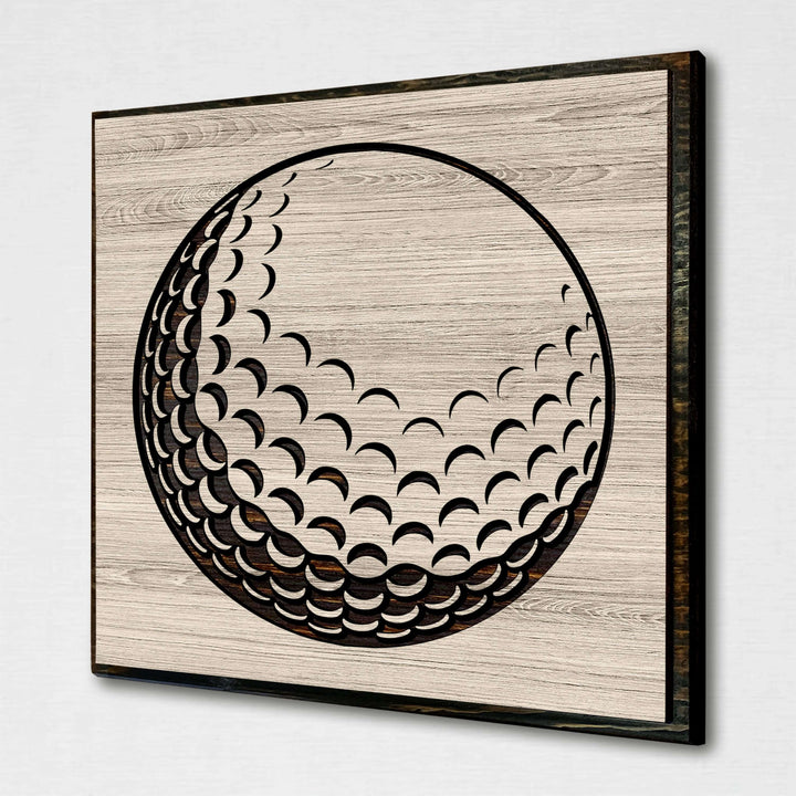 Golf ball wood wall art. Custom carved sports wall decor that is perfect for the basement, office, bar, basement, or man cave.
