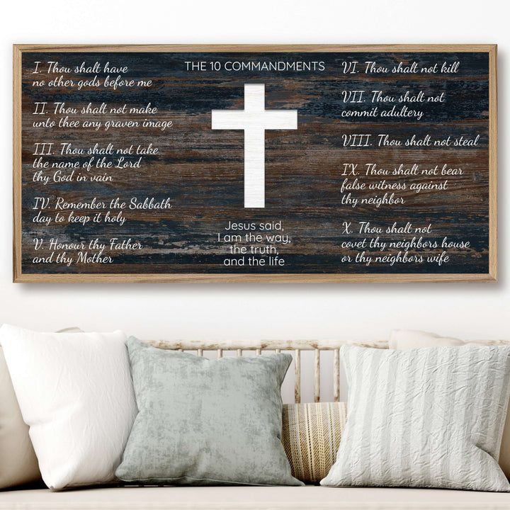 Ten commandments wood framed canvas wall art. This wall art features a thin, solid wood frame handcrafted at our shop located in Ashland, Nebraska. White distressed cross and text on a distressed blue woodgrain pattern background, on premium canvas with a high definition print.