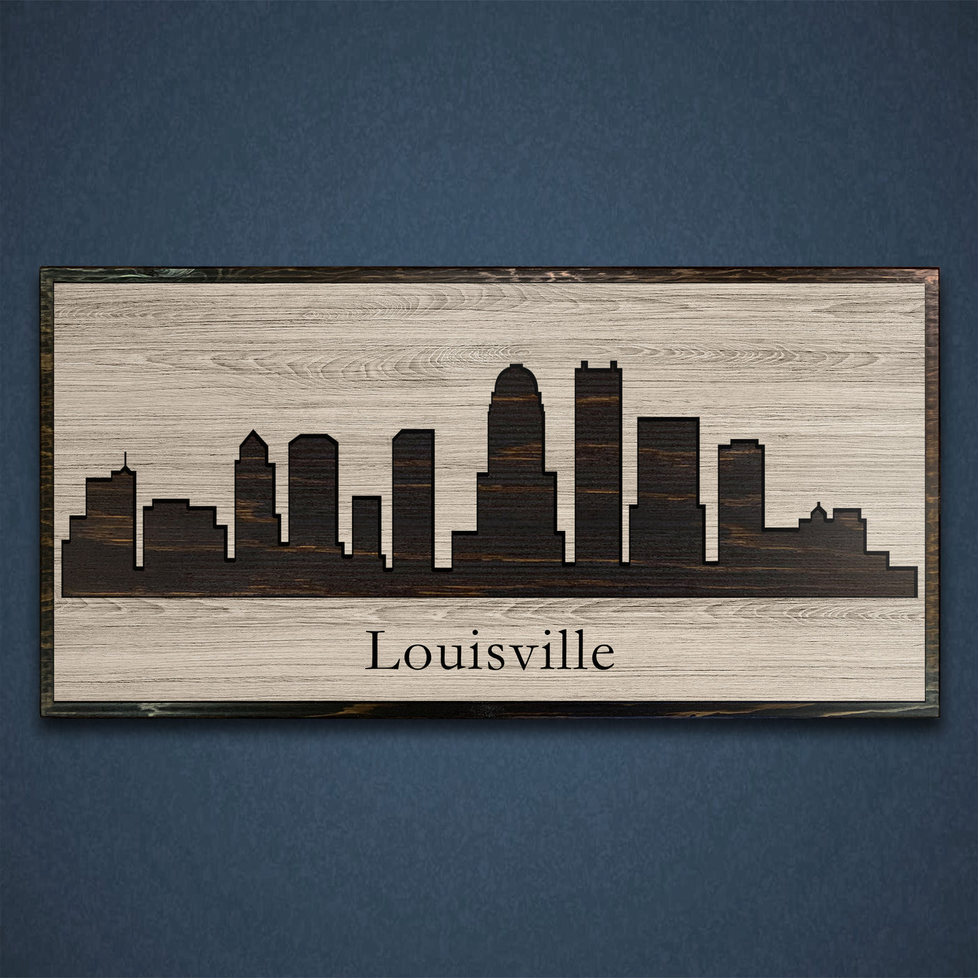 Louisville Kentucky city skyline wood all art. Custom carved into solid wood and features Howdy Owl's one-of-a-kind unique wood wall art finish. Personalized with your own text and a great gift idea for any occassion. Handcrafted in Ashland, Nebraska with shipping offered world-wide.