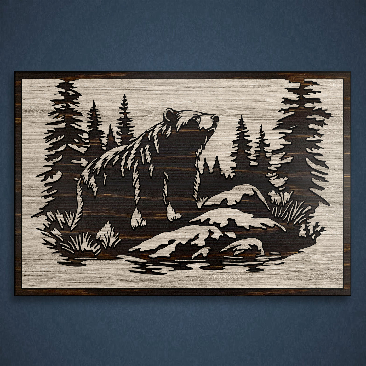 Grizzly bear carved wood wall art featuring Howdy Owl's unique, one of a kind wood finish. This wall art features a grizzly bear, pine tree forest, mountain nature scene that is carved into wood. Handcrafted at our shop located in Ashland, Nebraska our wood wall art can have a distressed tan main board with a dark brown stained carving and edge, or a distressed gray main board with a black stained carving and edge.