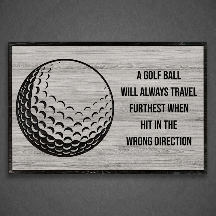 Golf ball wood wall art. Custom carved sports wall decor that is perfect for the basement, office, bar, basement, or man cave.