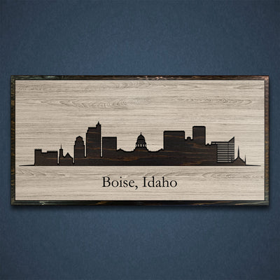 Boise, Idaho city skyline wood all art. Custom carved into solid wood and features Howdy Owl's one-of-a-kind unique wood wall art finish. Personalized with your own text and a great gift idea for any occassion. Handcrafted in Ashland, Nebraska with shipping offered world-wide.