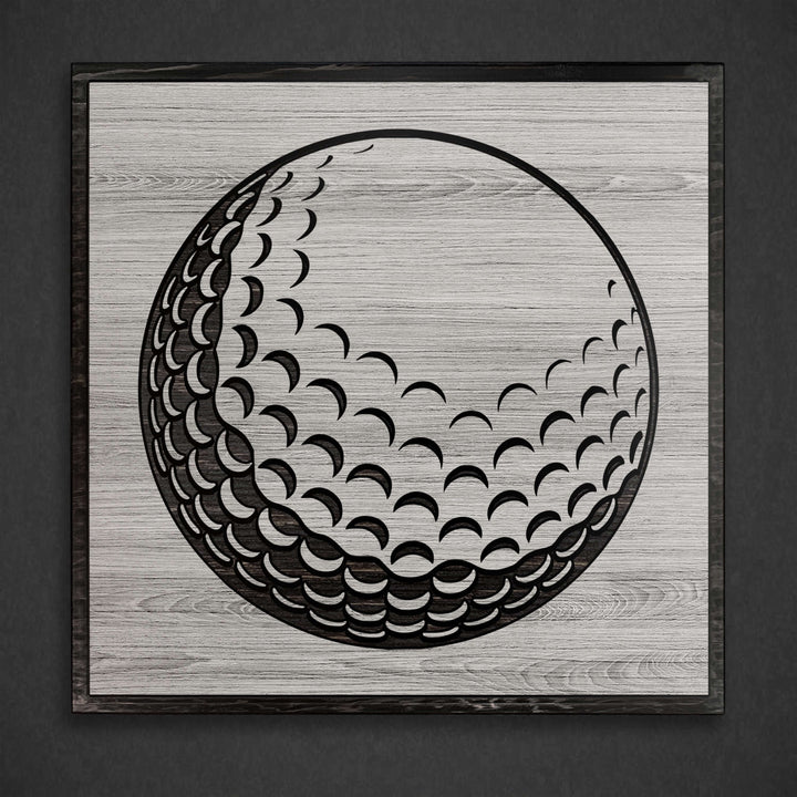 Golf ball wood wall art. Custom carved sports wall decor that is perfect for the basement, office, bar, basement, or man cave.