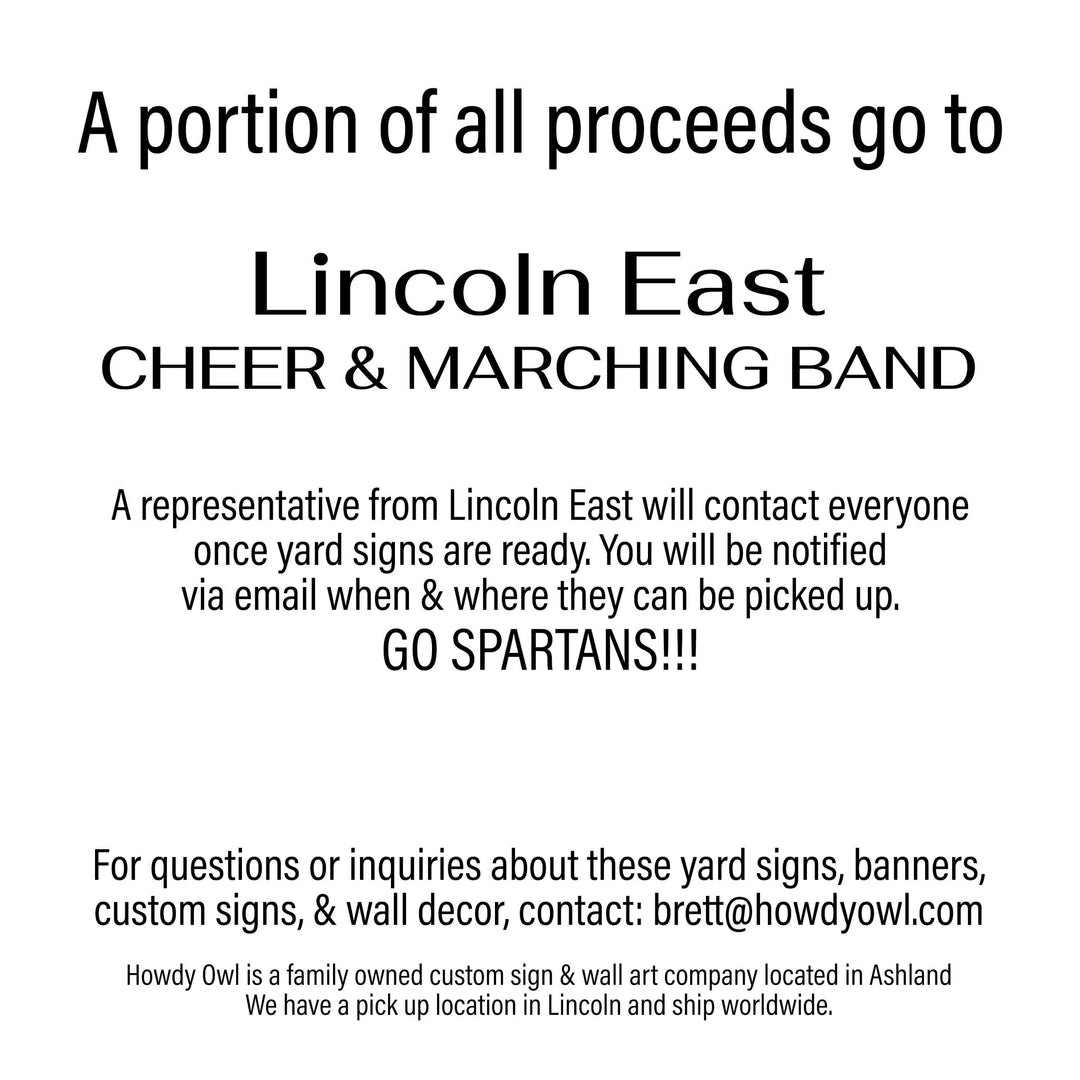 Personalized yard sign for Lincoln East Spartans Marching Band. The sign features the school colors and can be personalized with a students name.