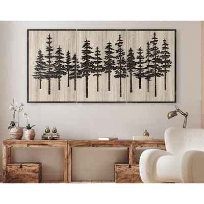 Pine tree forest wood wall art carved into solid wood. The stunning artwork features a carved pine tree scene nestled against a serene forest backdrop. That natural variations in the wood grain add a depth and character to the overall design, creating a warm and inviting atmosphere for any room.