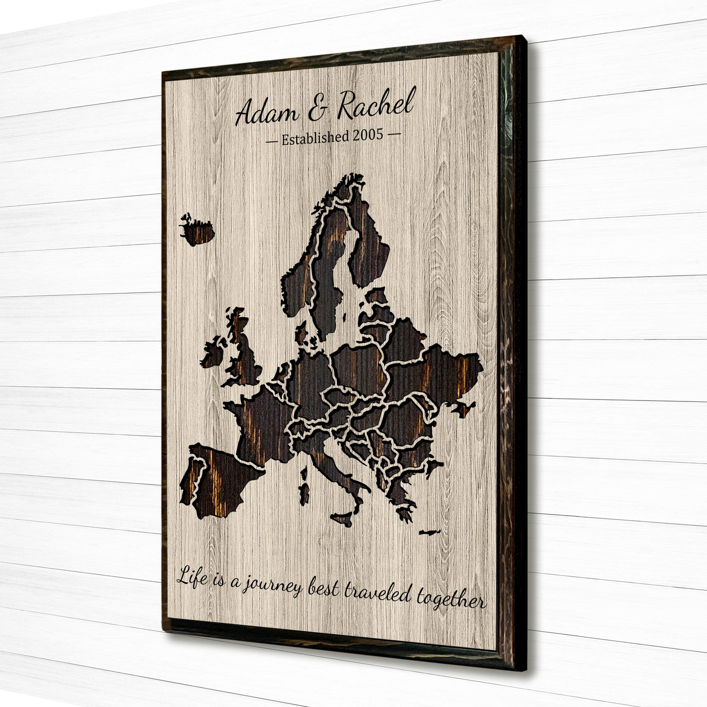 Handcrafted wooden map of Europe, intricately carved to display the continent's borders. Purchase from our large selection of decorative push pins to highlight visited and desired travel destinations across European countries.
